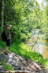 Nature photographer at riverside