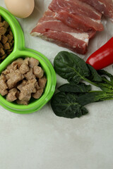 Concept of organic pet food on white textured background