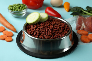 Concept of organic pet food on blue background