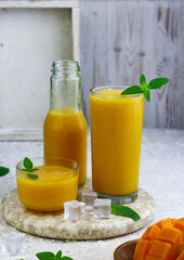 Mango Juice or jus mangga on white background. Fresh healthy during during summer holiday. 
