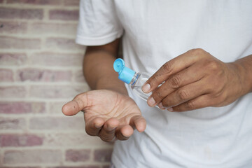 Using sanitizer liquid for preventing corona virus 