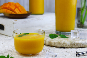 Mango Juice or jus mangga on white background. Fresh healthy during during summer holiday. 