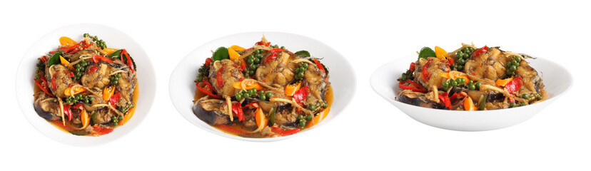 Stir fried spicy cat fish in white ceramic dish on white background