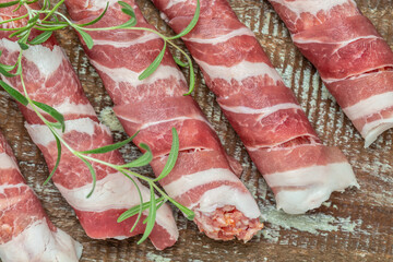 rolls of meat with bacon, chevapchichi or Kofta kebab, Food recipe background. Close up