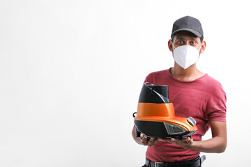 Young indian man who repair electronics kitchenware holding tools and mixer in hand