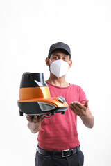Young indian man who repair electronics kitchenware holding tools and mixer in hand
