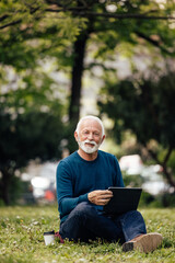 Fototapeta premium Senior man, making sure his company prospers.