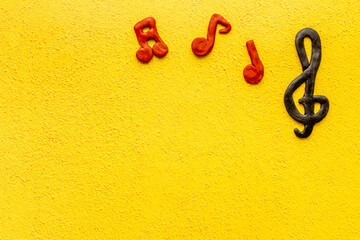 Fototapeta premium Flat lay of music notes, space for text. Music background