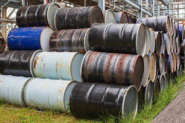 Oil barrels blue or chemical drums horizontal stacked up