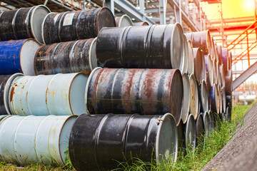 Oil barrels blue or chemical drums horizontal stacked up