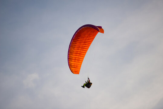 Paragliding Against the Sky in Switzerland.
