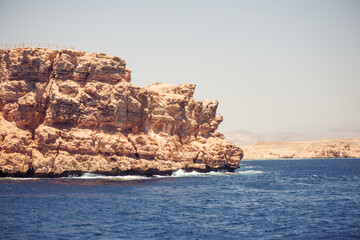 Fototapeta na wymiar red sea coastline landscape with Egypt mountains on background