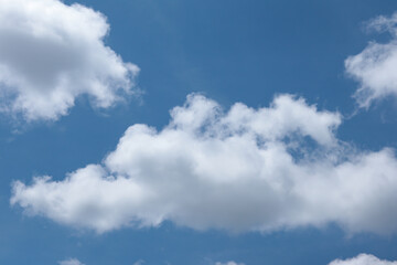 Naklejka na ściany i meble bright blue sky and thin white little clouds.