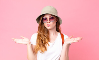 red head pretty woman tourist feeling puzzled and confused and doubting