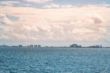 Cancun view from Isla Mujeres with the ocean in between.