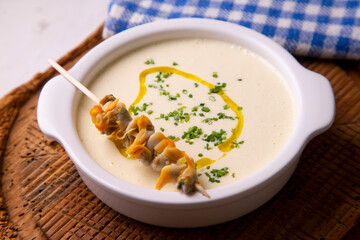 Cream of asparagus with cockles. Traditional tapas starter from southern Spain.