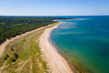 Fototapeta na wymiar Aerial view to Baltic sea beach in Estonia at sunny day