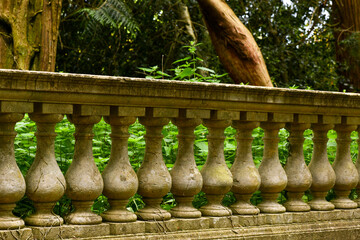 fence around the property is carved, porch