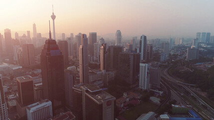 AERIAL. Pink sunrise in Kuala Lumpur city.