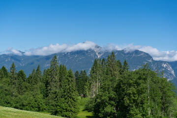 Fototapeta na wymiar View from the Eckbauer mountain over the Bavarian Alps near Garmisch-Partenkirchen