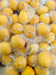 pile of fresh lemons for sale at the fruit market