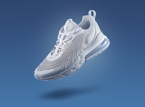 White sneaker on a blue gradient background, men's fashion, sport shoe, air, sneakers, lifestyle, concept, product photo, levitation concept 