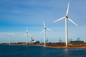 Wind turbines in the bay of the seaport of Fos-sur-Mer, France.