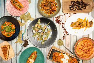 Set of recipes for fusion food of various nationalities. Clams in seafood sauce with Chinese noodles, mussels in sauce, fried eggs with beef tripe, gnocchi with meat, brownie