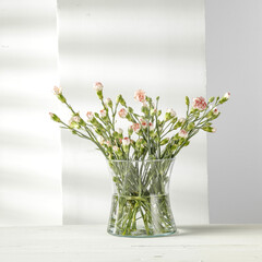 Desk of free space and fresh flowers 