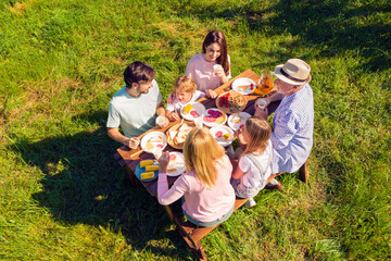 High above angle view big full family having picnic cheerful on holidays spending time together...
