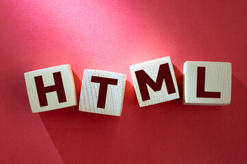 Obraz premium html inscription on wooden cubes on a red background