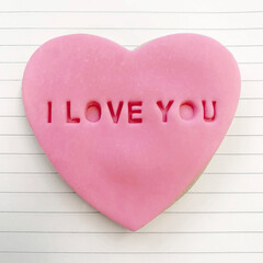 Heart-shaped Pink Cookie saying 