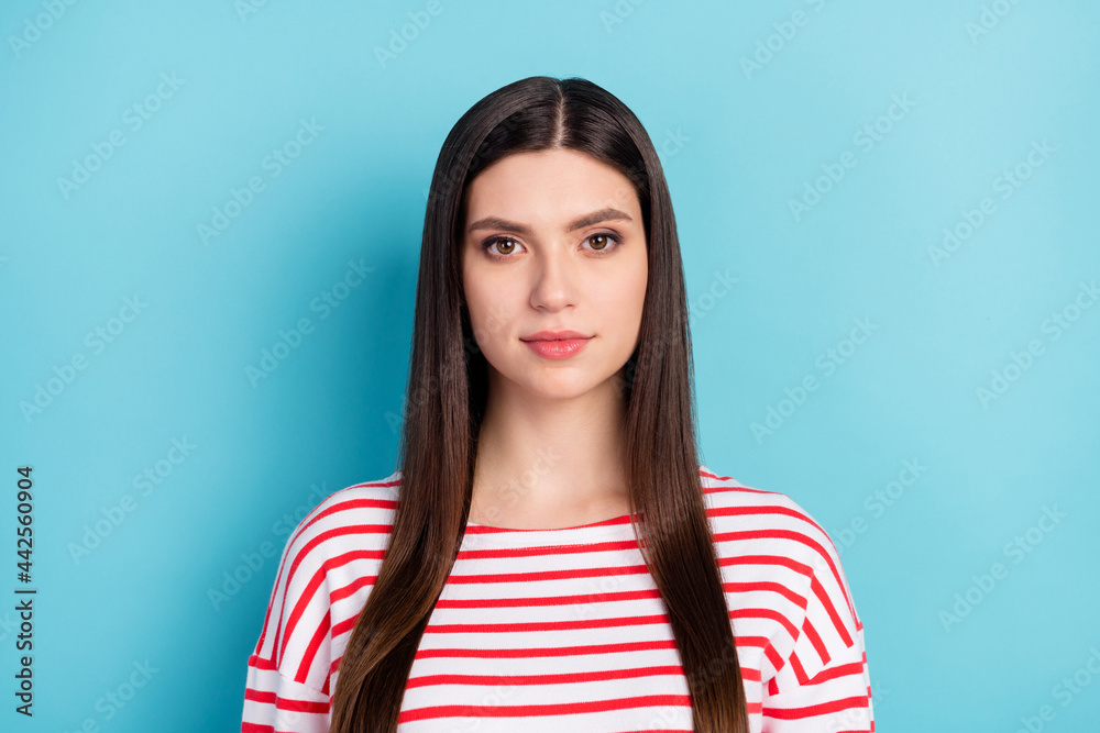 Sticker portrait of attractive content calm long-haired girl wearing striped t-shirt isolated over bright bl