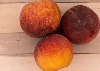 peaches on a wooden background