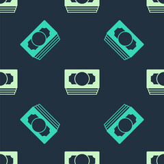 Green and beige Stacks paper money cash icon isolated seamless pattern on blue background. Money banknotes stacks. Bill currency. Vector