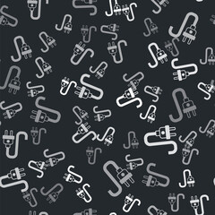 Fototapeta na wymiar Grey Electric plug icon isolated seamless pattern on black background. Concept of connection and disconnection of the electricity. Vector