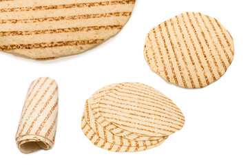 Grilled pitta bread isolated on white background.