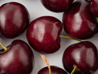 ripe cherries on a white background