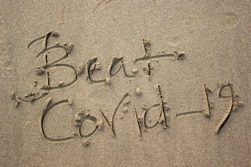 Corona Words at Sea Sand