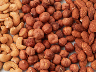 The natural background is made of different types of nuts. super food.
