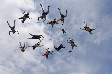 Skydiving. Half-naked skydivers are falling in the sky.