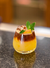 A cocktail of their espresso and orange juice