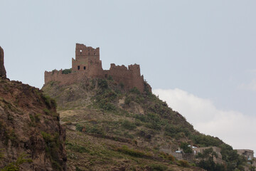 Fototapeta na wymiar ( Somara Castle ) the ruin of historical Castle in the highest mountains of Ibb government