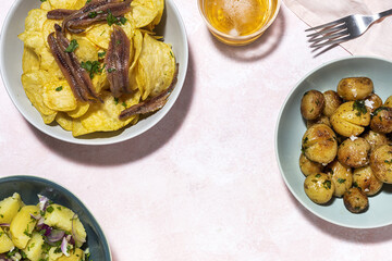 Assortment of potato, fried, cooked, chips and french fries snacks