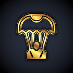 Gold Parachute icon isolated on black background. Vector