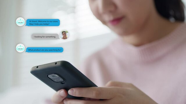 Close-up hand asian people use mobile phone happy buy online at home talk to ai shop store app ask data chat bot in sme social e-commerce web B2C crm iot pop up dialog text help seller smart life.