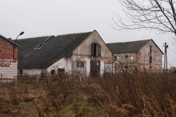 Obraz premium The abandoned distillery next to the palace