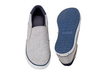 Mans gray shoes. Close-up of a pair gray sneaker or sport shoes isolated on a white background. Elegant and trendy mens footwear. Macro.