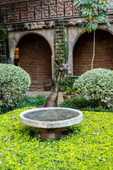 park near the country house decorated with animal symbols of africa