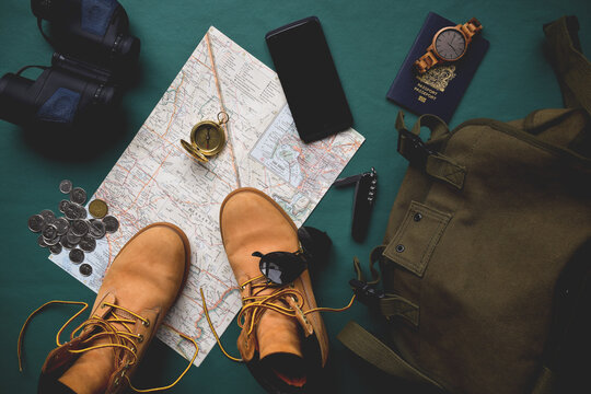 Map and travel essentials flatlay